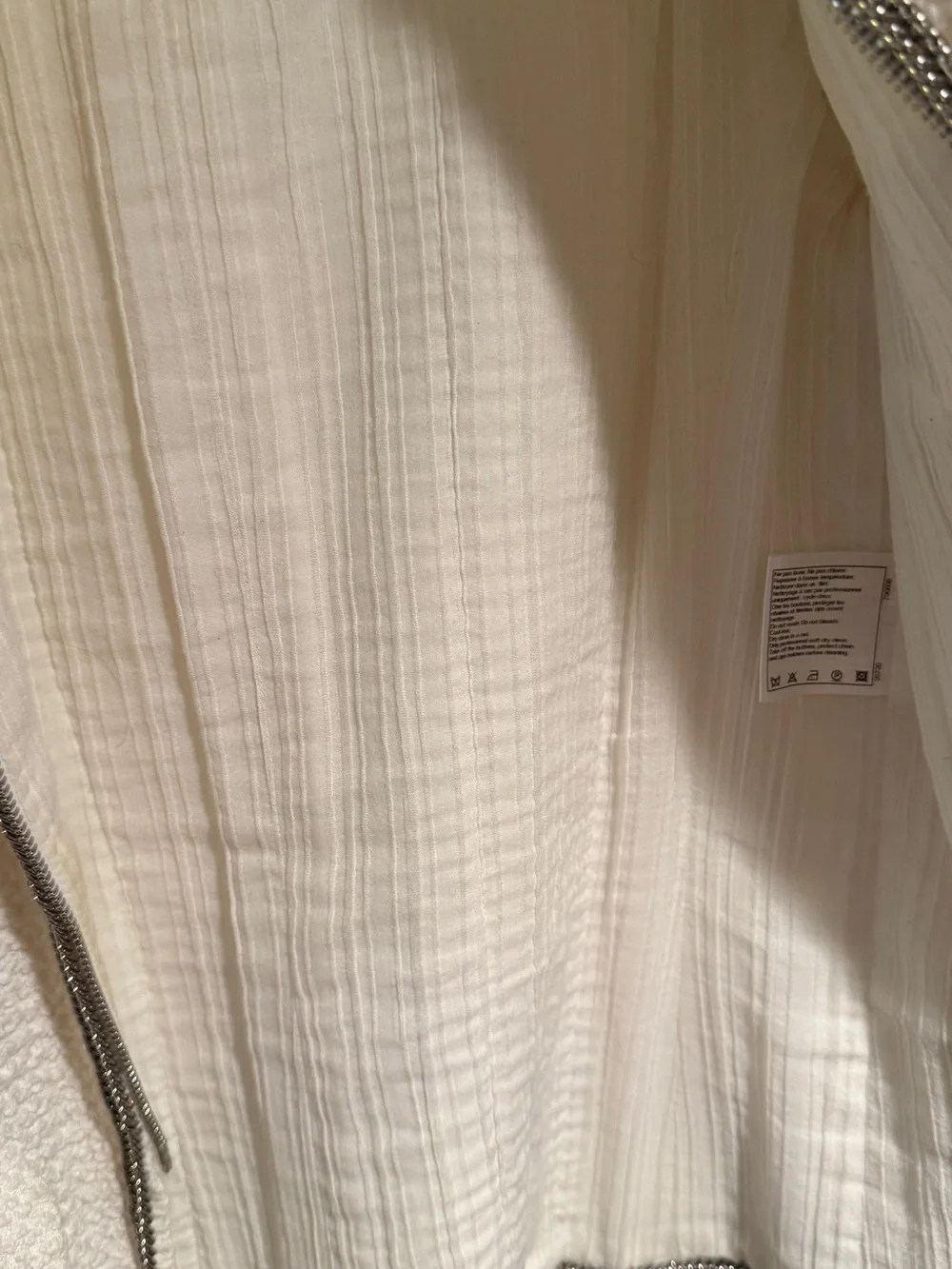 CHANEL Cream Bouclé Zip Jacket with Four Pockets